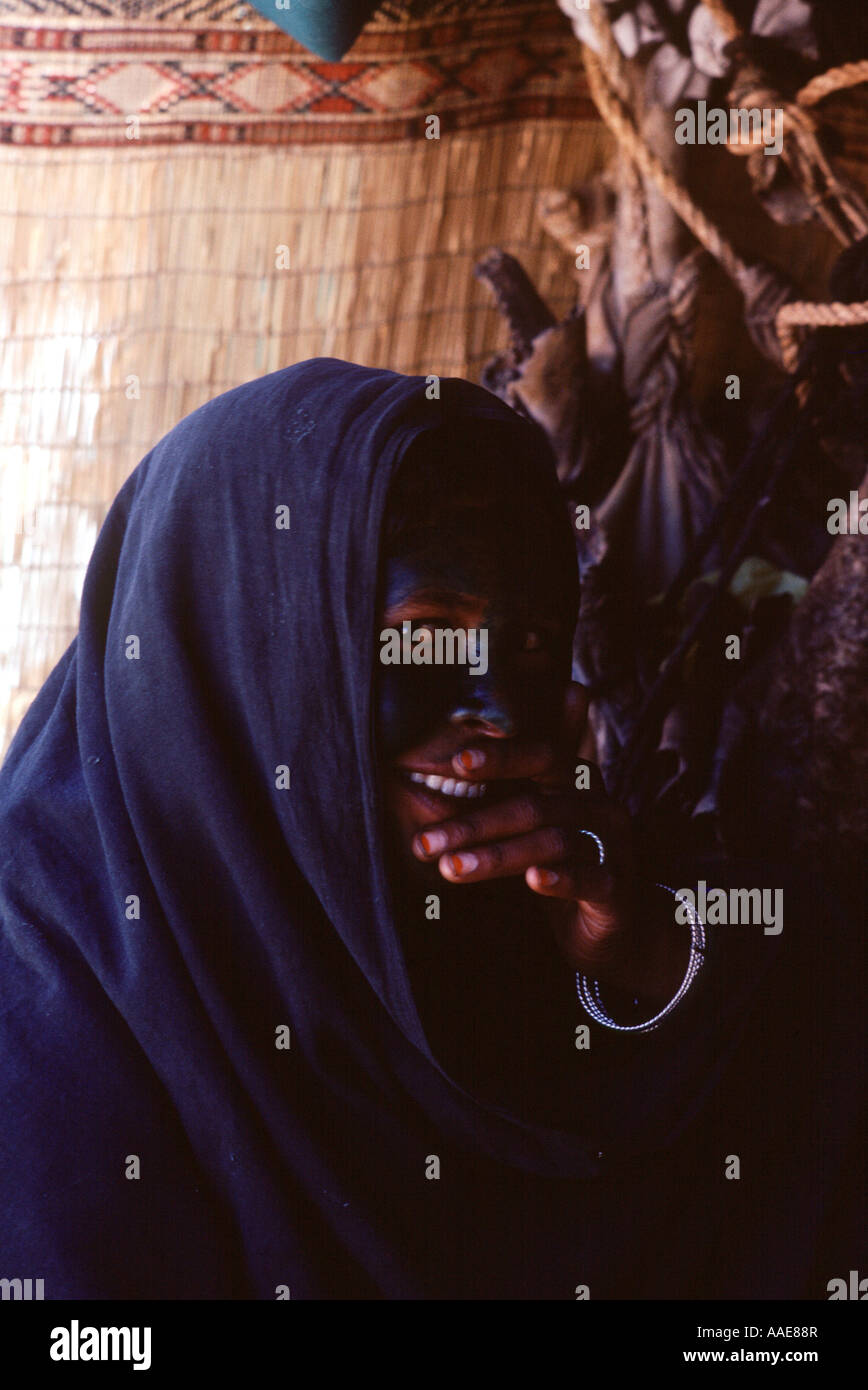 Algeria.Near Tamanrasset Tuareg woman face decorated with henna A rare photo as difficult to photograph women here. Stock Photo