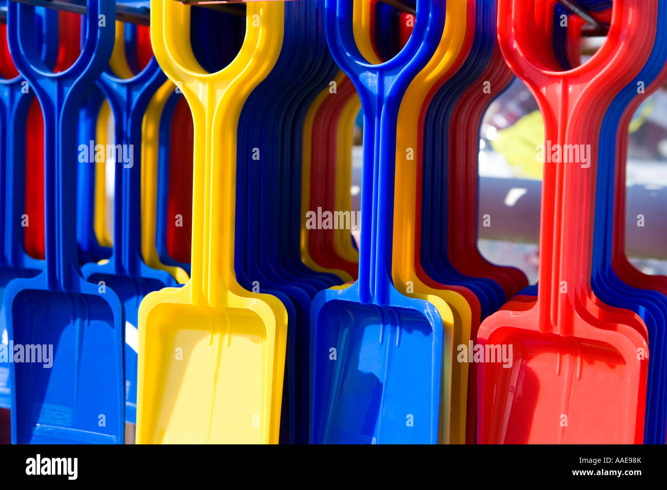 Coloured beach spades Stock Photo Alamy