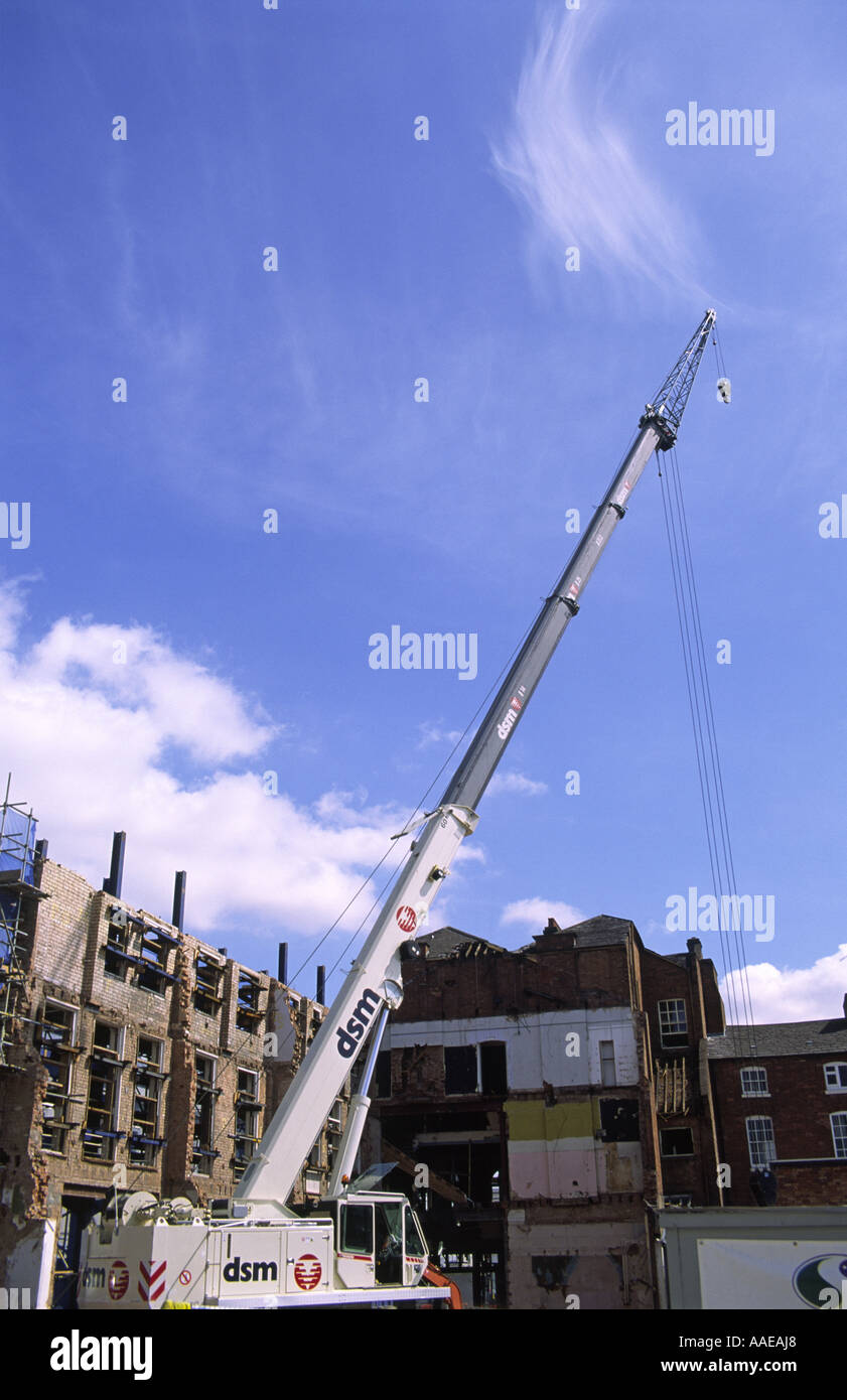 Shored up preserved brick facade of former Woodwards department store, Leamington Spa