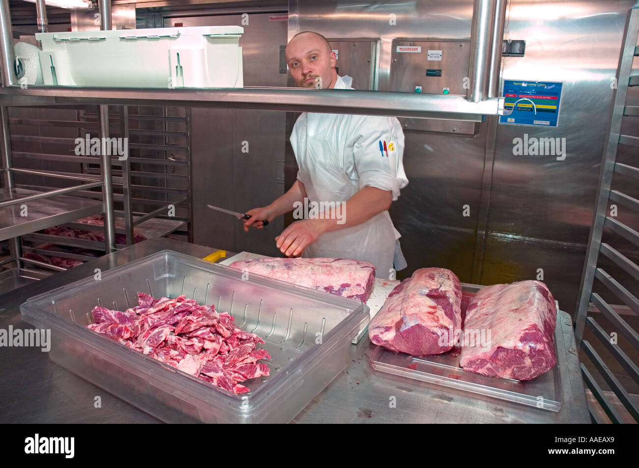 Cook Working In The Queen Mary 2 Cruise Ship Galley Stock Photo Alamy