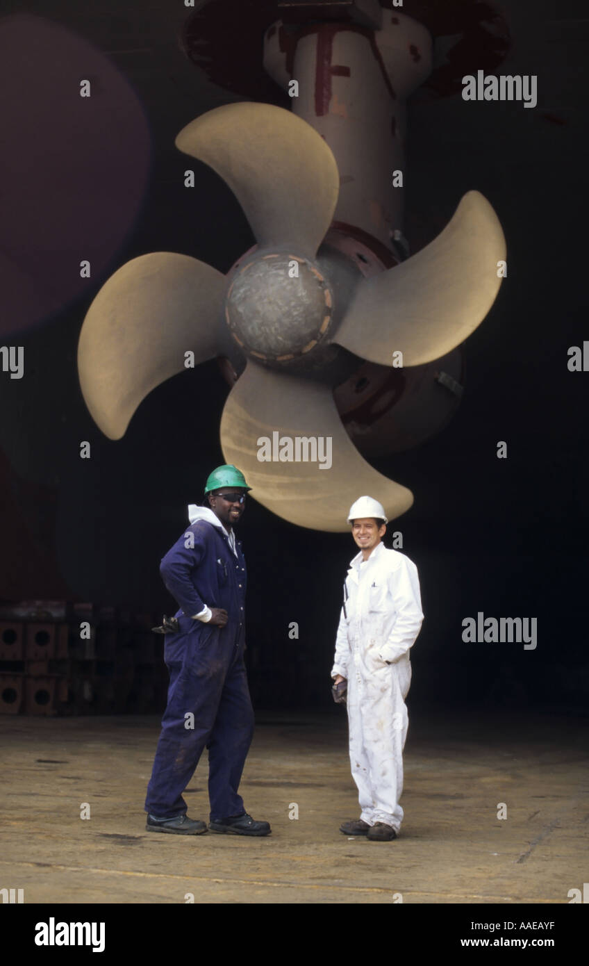 Dock workers in Freeport, Bahamas Stock Photo
