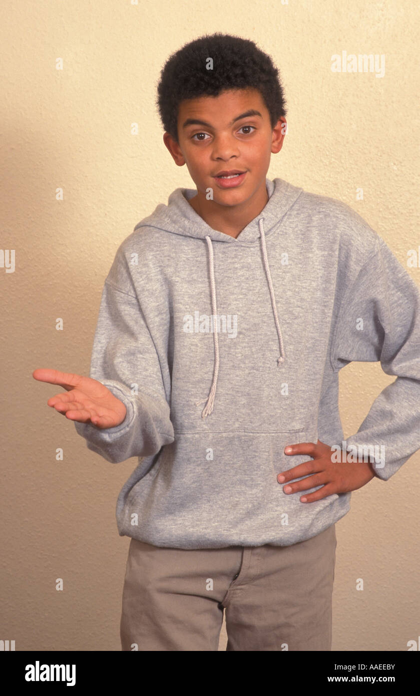 portrait mixed race young teenage mixed race boy acting expressing