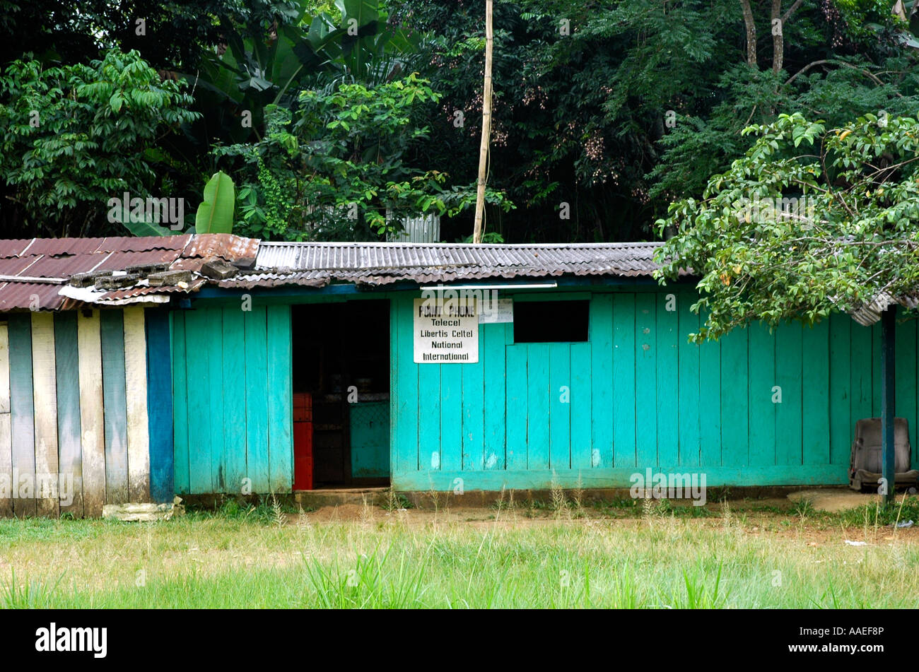 Roadside shack in Gabon is also a Phone Point permitting worldwide telephoning Stock Photo