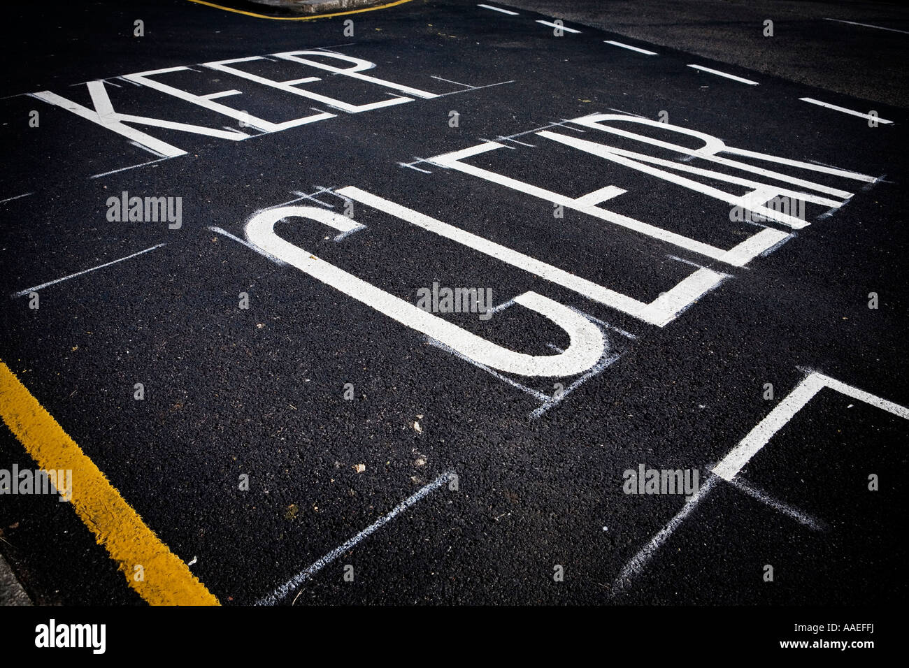 Sign keep clear keep clear painted on road hires stock photography and
