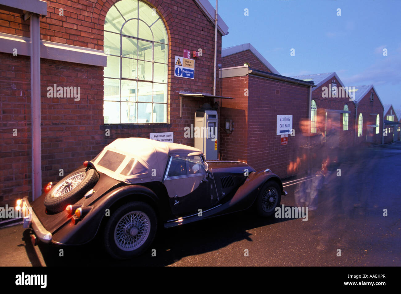 Car Factory workers passing Malvern Link Worchestershire England