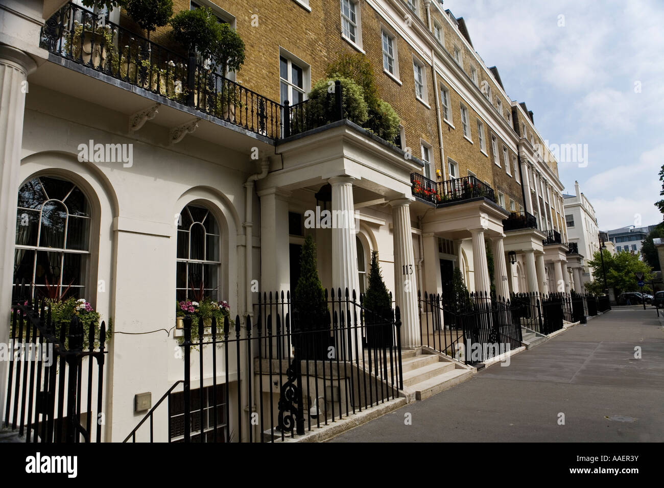 Row of townhouses in Eaton Square Belgravia exclusive area of London SW1 Stock Photo