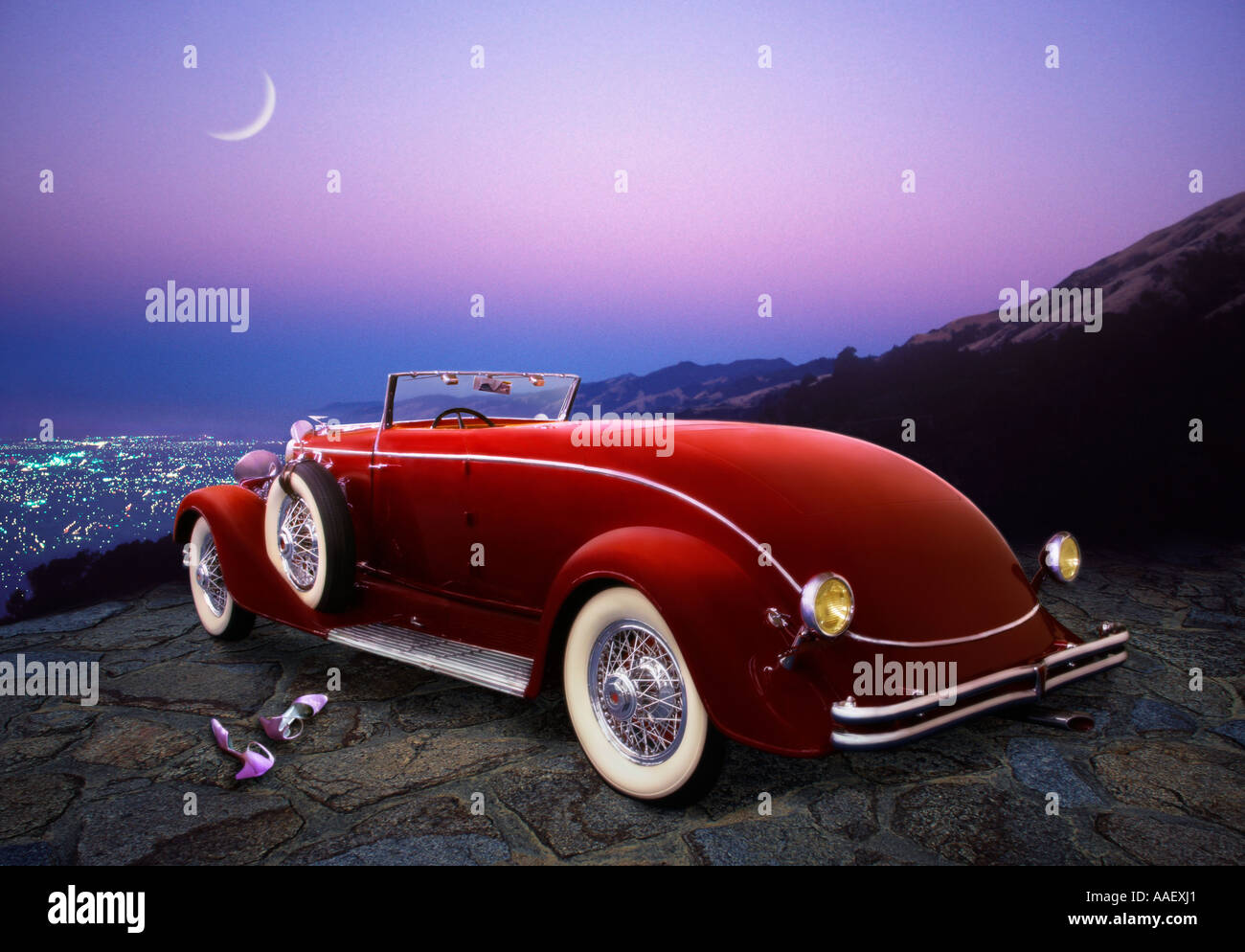 classic automobile red roadster Duesenberg parked over looking city at ...