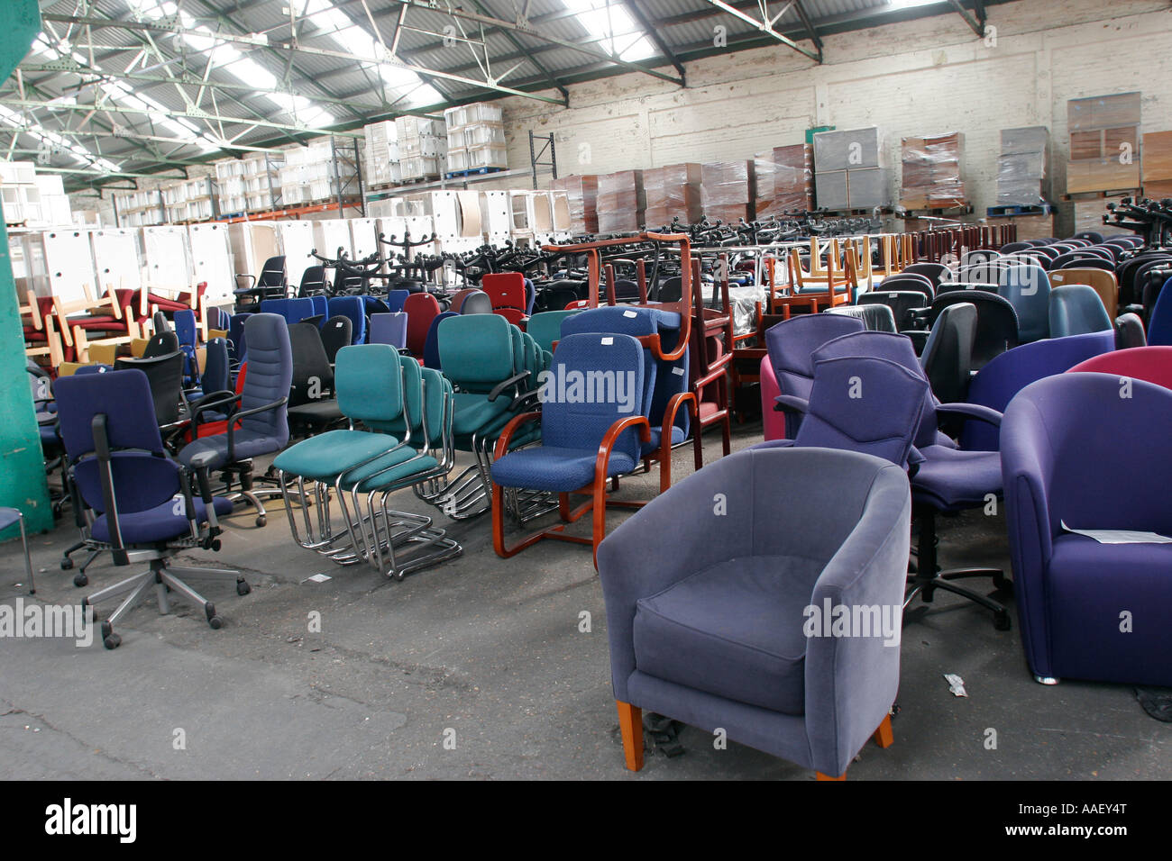 Used Office furniture in warehouse for recycling Stock Photo Alamy