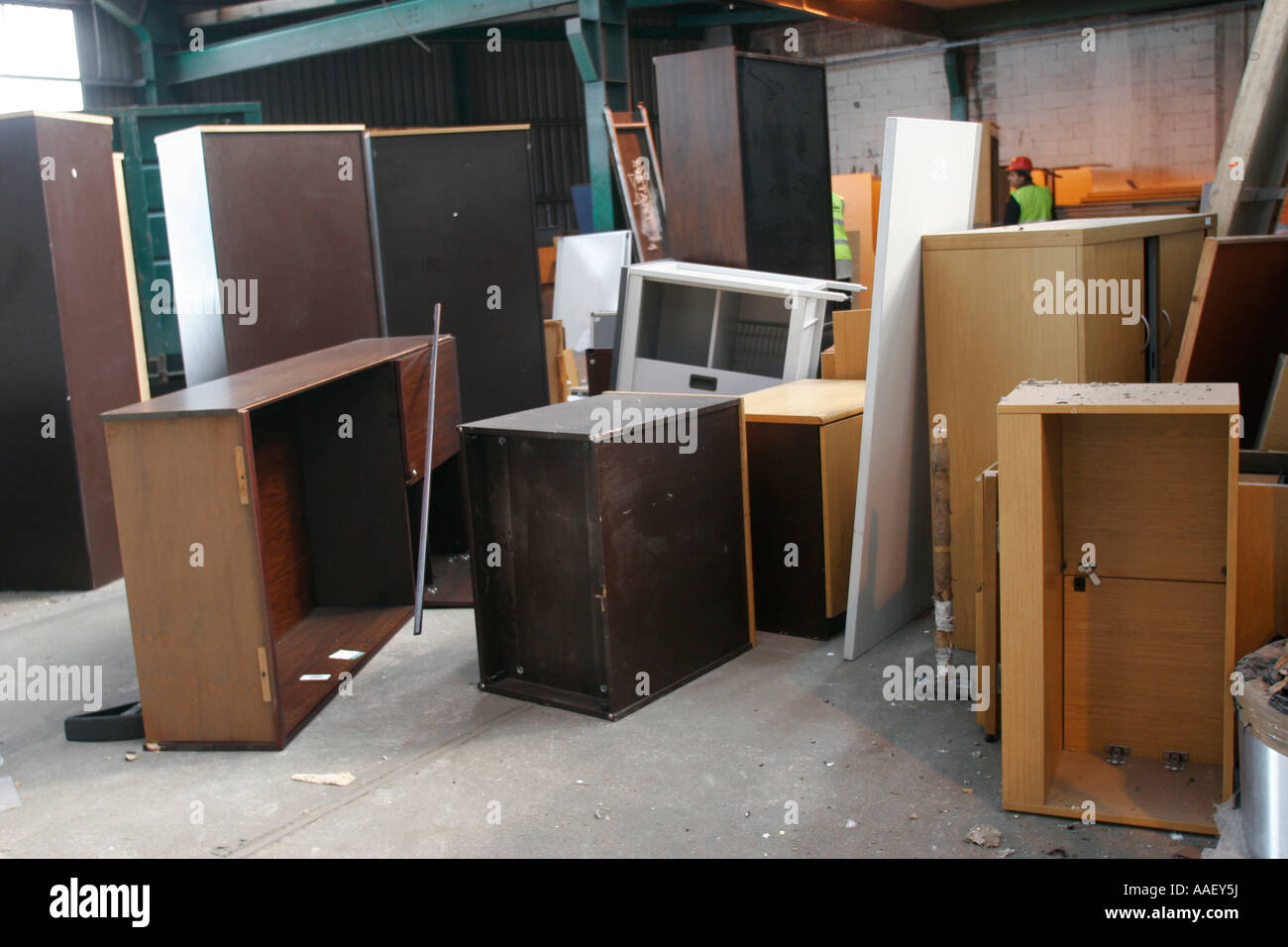 Used Office furniture in warehouse for recycling Stock Photo Alamy