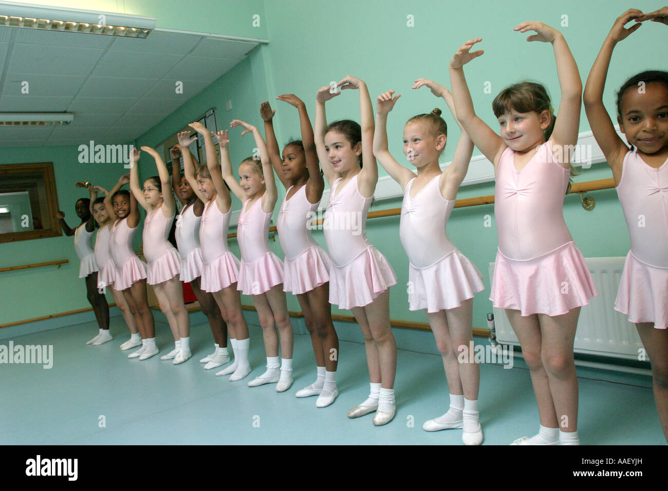 https://c8.alamy.com/comp/AAEYJH/primary-school-girls-ballet-lesson-AAEYJH.jpg