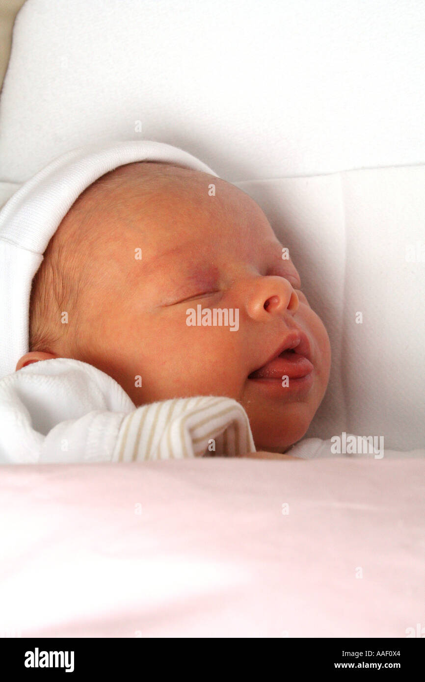 Newborn baby in cot asleep Stock Photo Alamy