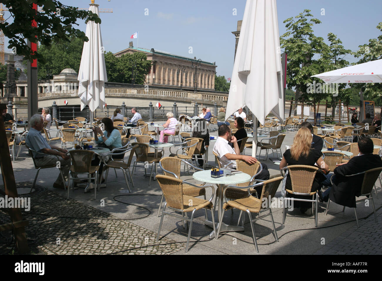 Cafe by River Spree, with Alte Nationalgalerie in background, Berlin Stock Photo