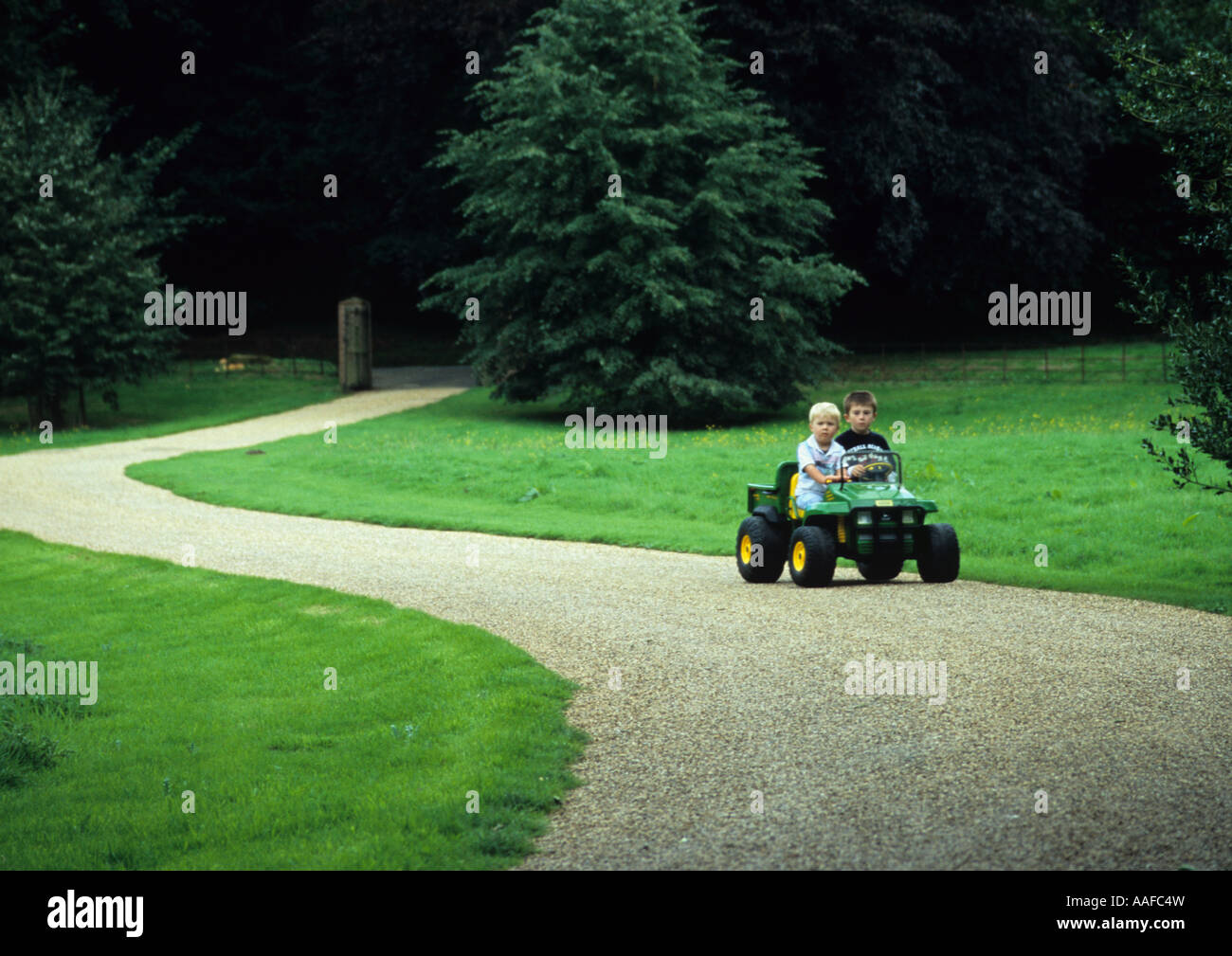 Brothers On Electric Jeep in the uk Stock Photo Alamy