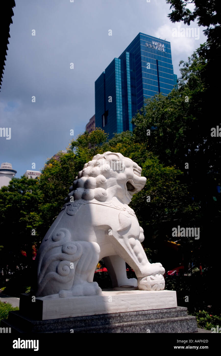 Lion statue outside the CK Tang department store on Orchard Road Singapore Stock Photo