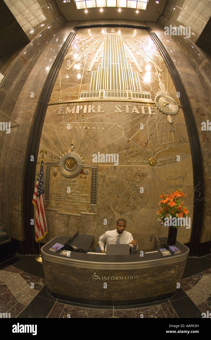 Empire State Building interior lobby with stars and stripes american flag New York NYC USA United States of America Stock Photo