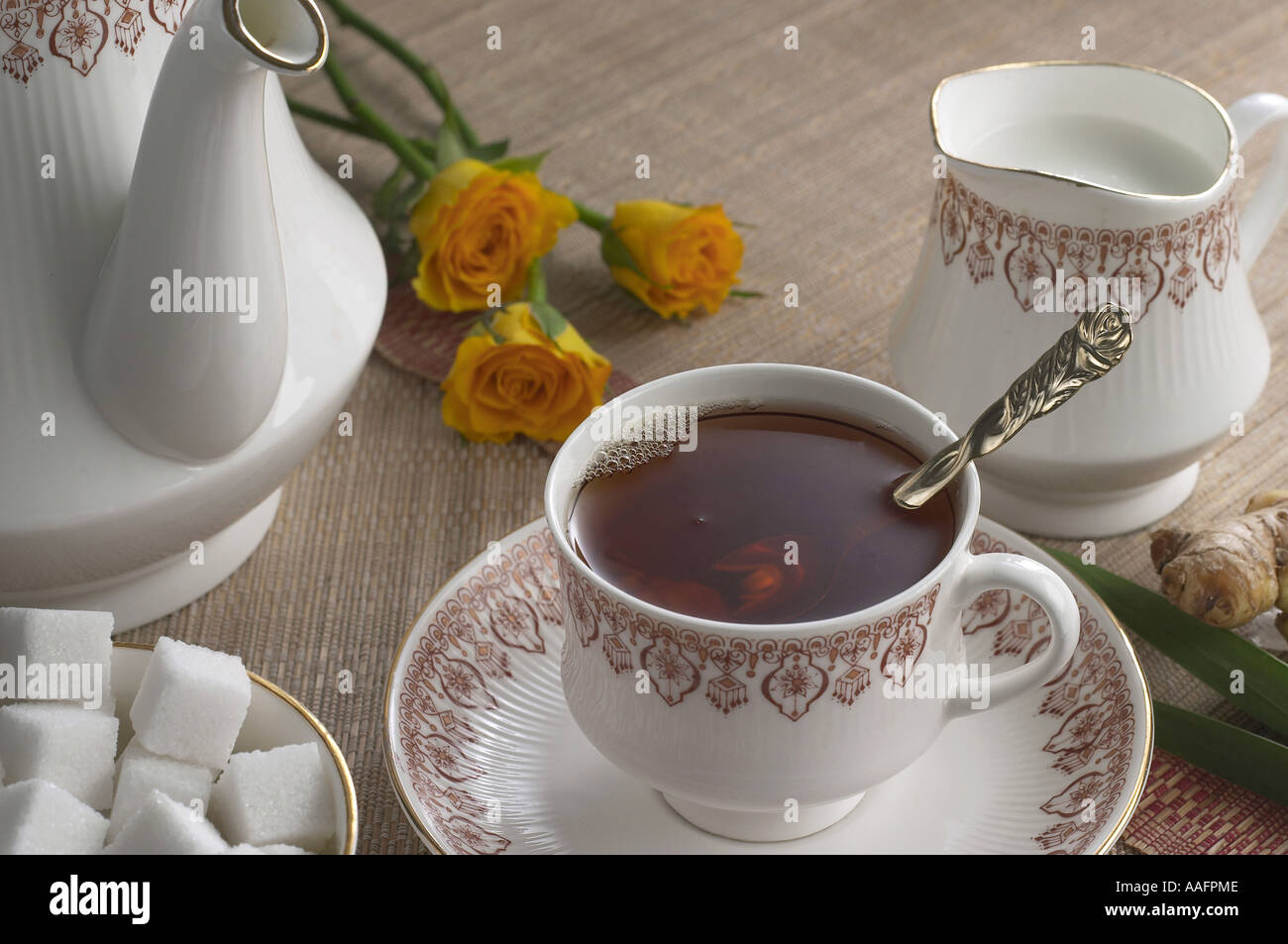 Hot drink black tea with sugar and milk Stock Photo Alamy