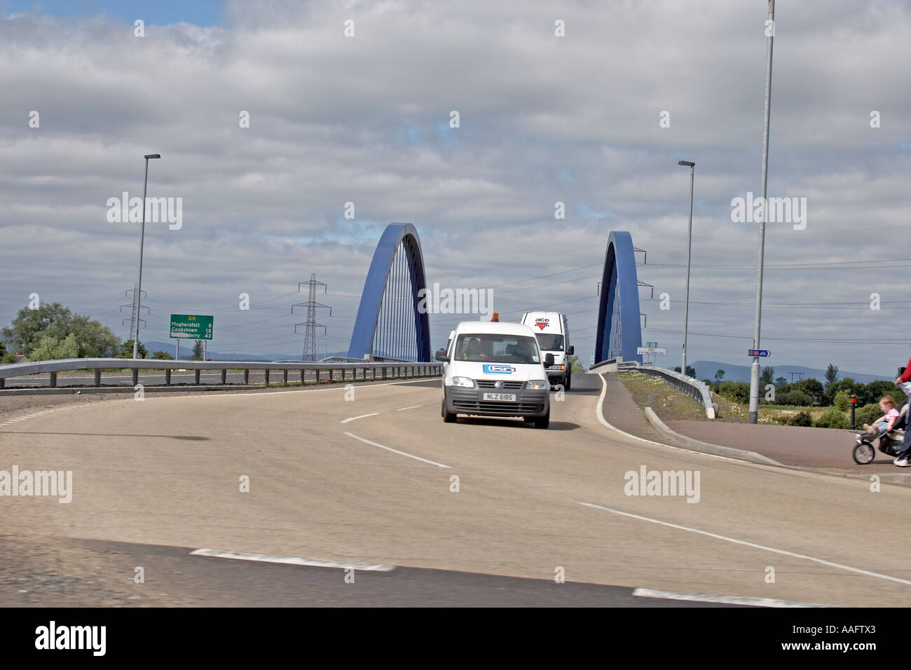 Arched steel suspension bridge competed 2005 over River Bann Toome Northern Ireland UK Stock Photo