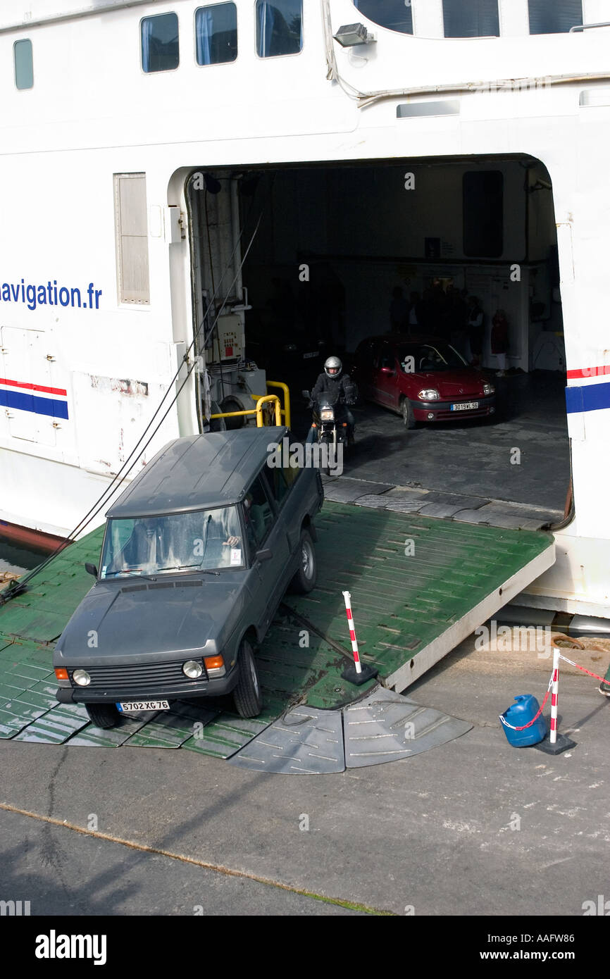 Cars leaving a car ferry france Stock Photo