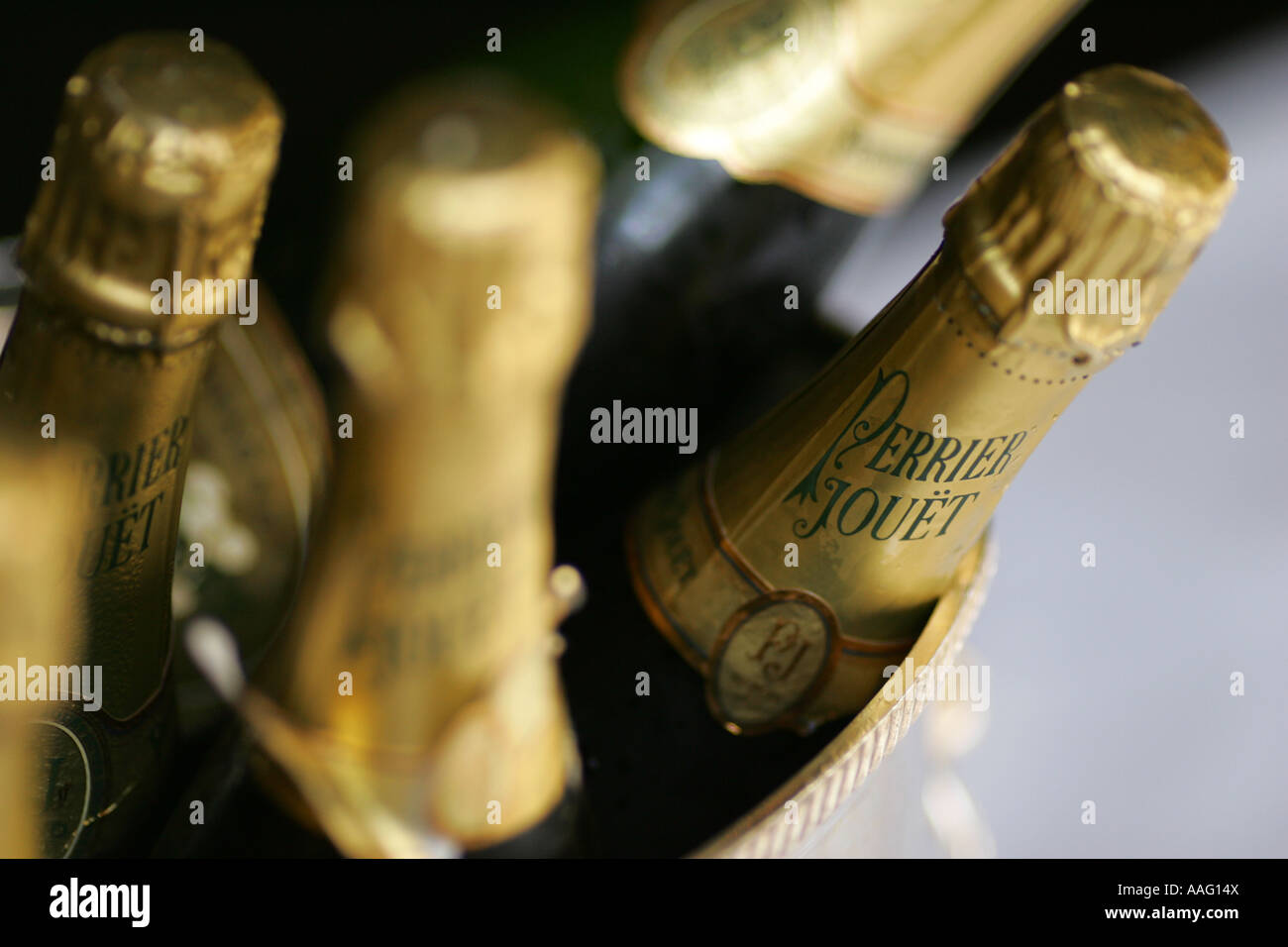 Champagne bottles in an ice bucket Stock Photo - Alamy