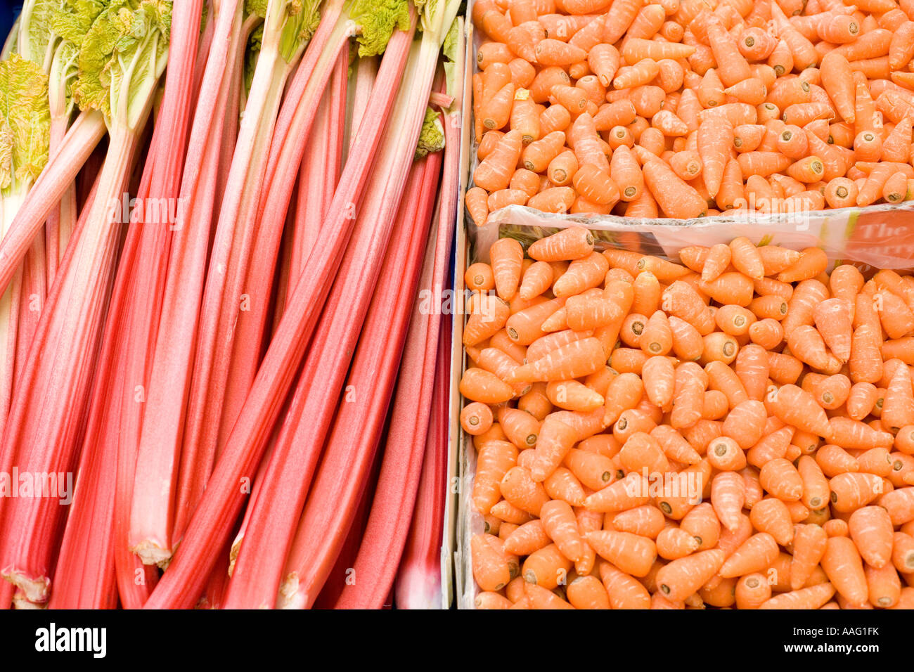 Carrots and rhubarb for sale in a Borough market, London Stock Photo