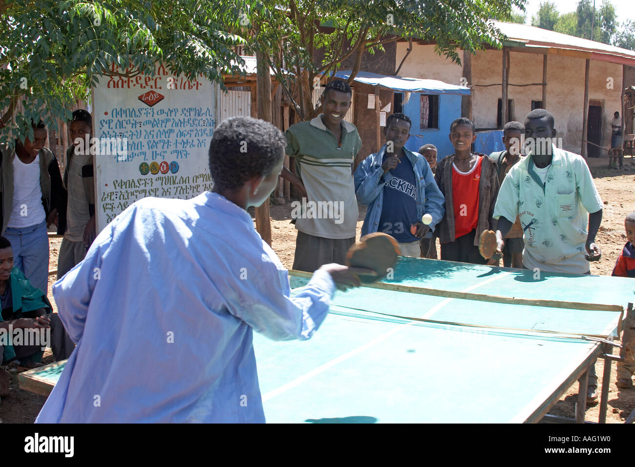 Men playing table tennis in the street in village of Kuch Ethiopia