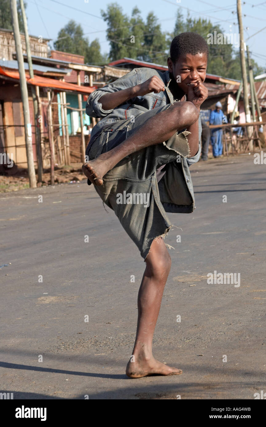 Young boy doing Karate kick in village of Dejen near Shafartak bridge Ethiopia Africa Amusing funny comic humourous Stock Photo - Alamy Young boy doing Karate kick in village of Dejen near Shafartak bridge Ethiopia Africa Amusing funny comic humourous Stock Photo - Alamy