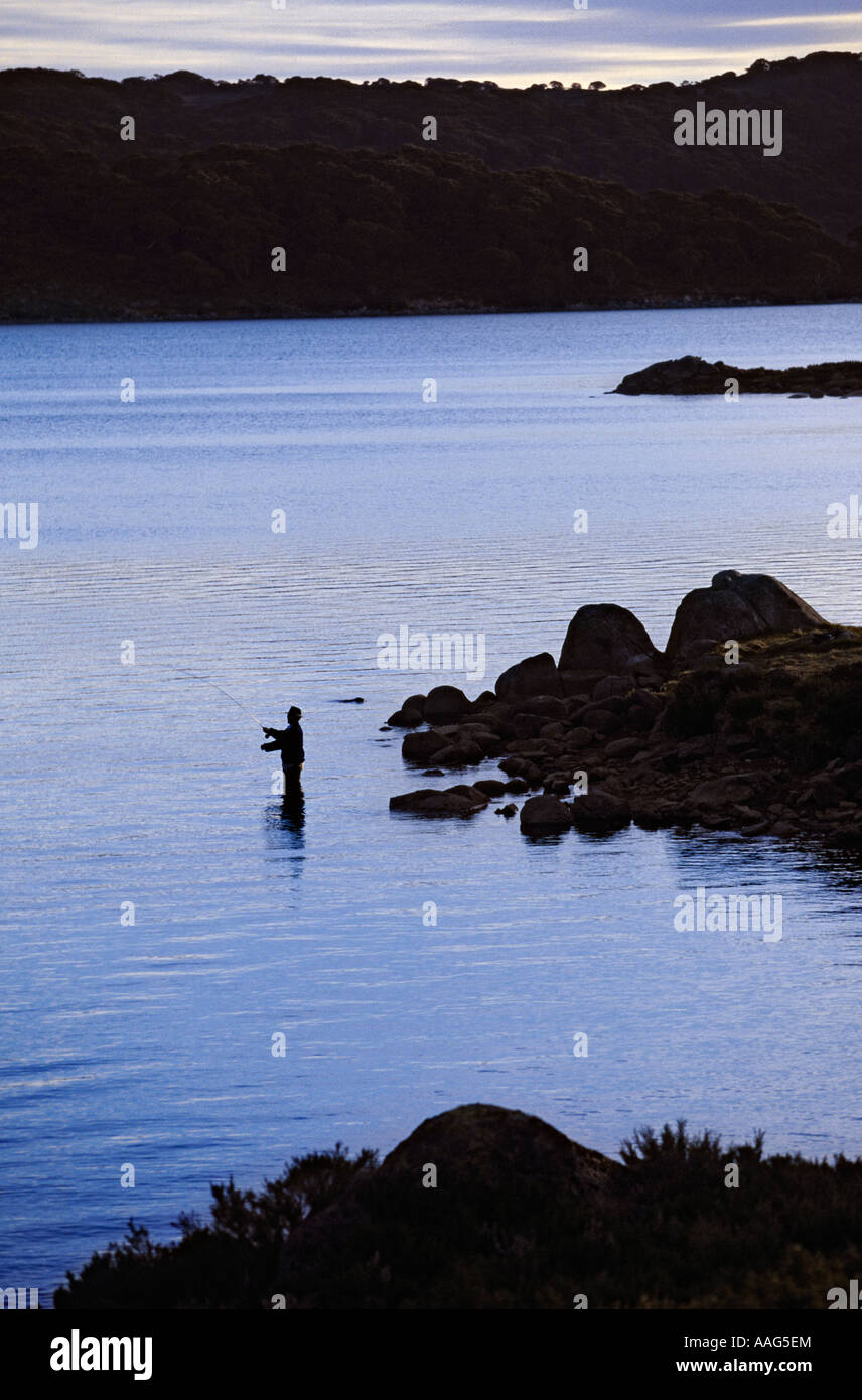 Fly fishing on Rocky Valley Dam, near Falls Creek, Bogong High Plains