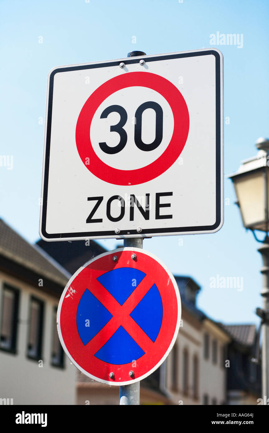 German 30 kph speed and No Waiting zone sign in a city centre Stock Photo