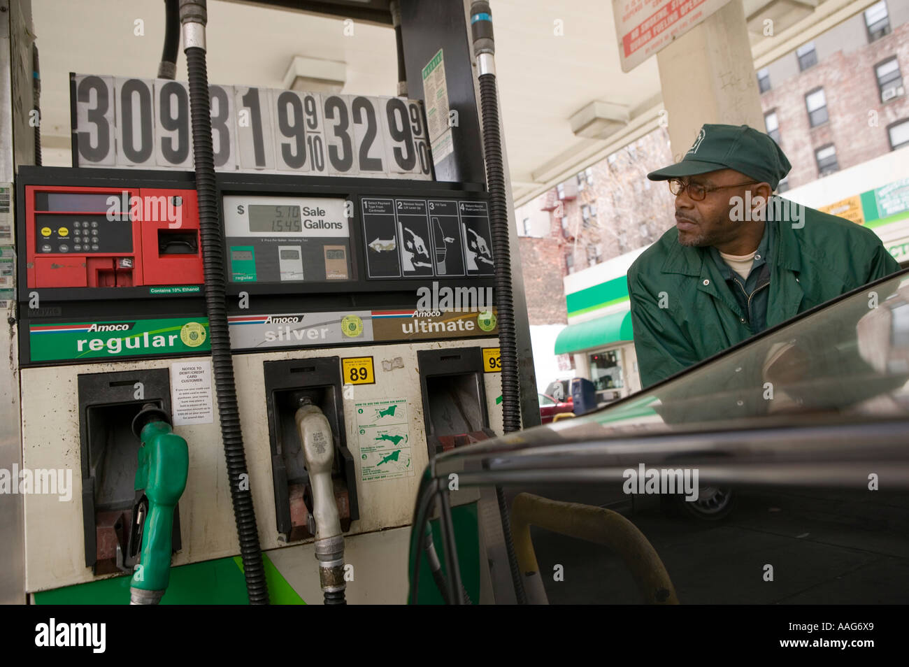 Filling up the car at a gas station in Harlem New York City USA April ...