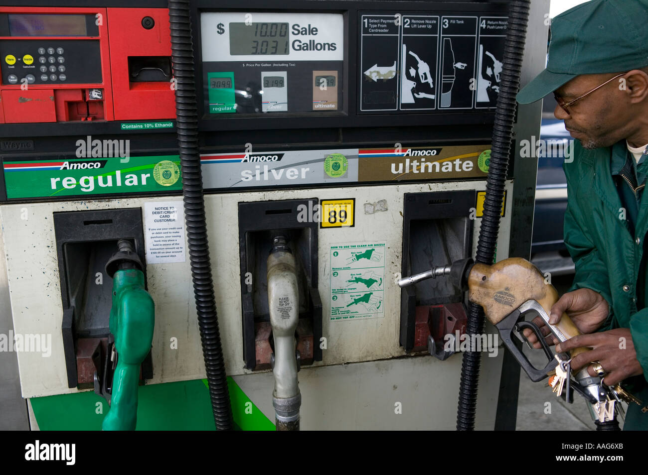 Filling up the car at a gas station in Harlem New York City USA April ...