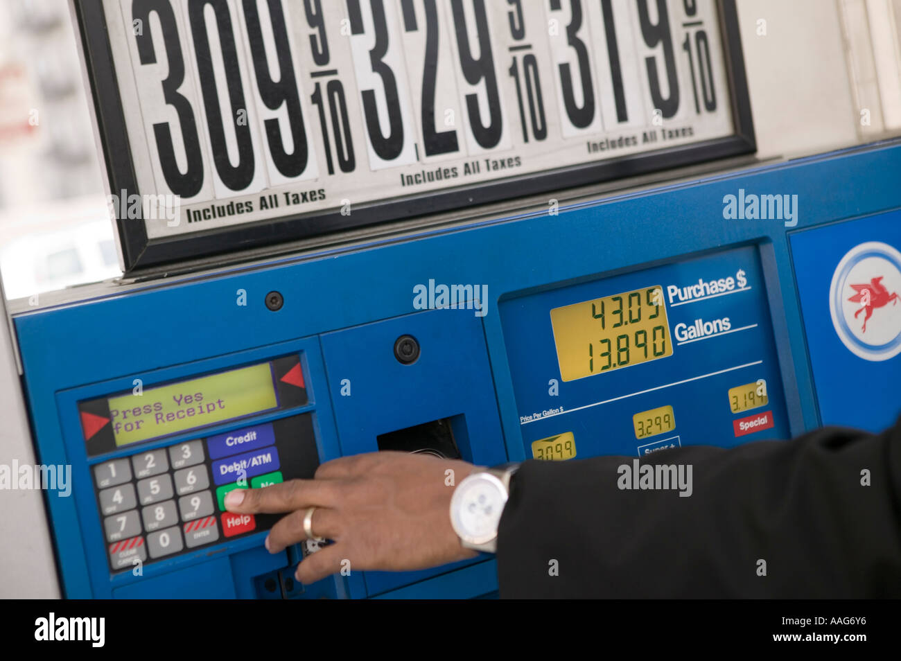 Filling up the car at a gas station in Harlem New York City USA April ...
