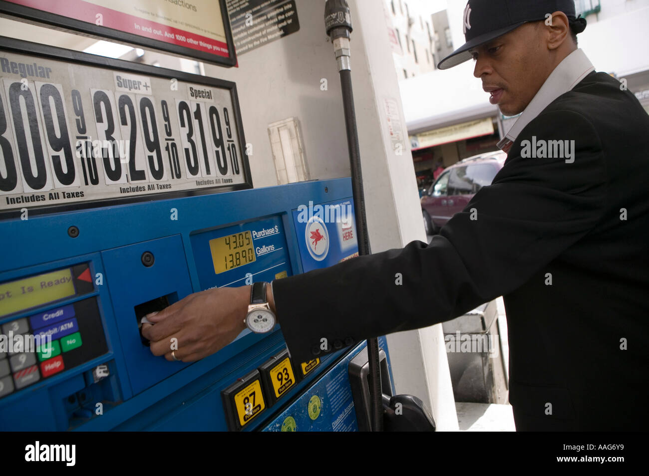 Filling up the car at a gas station in Harlem New York City USA April ...