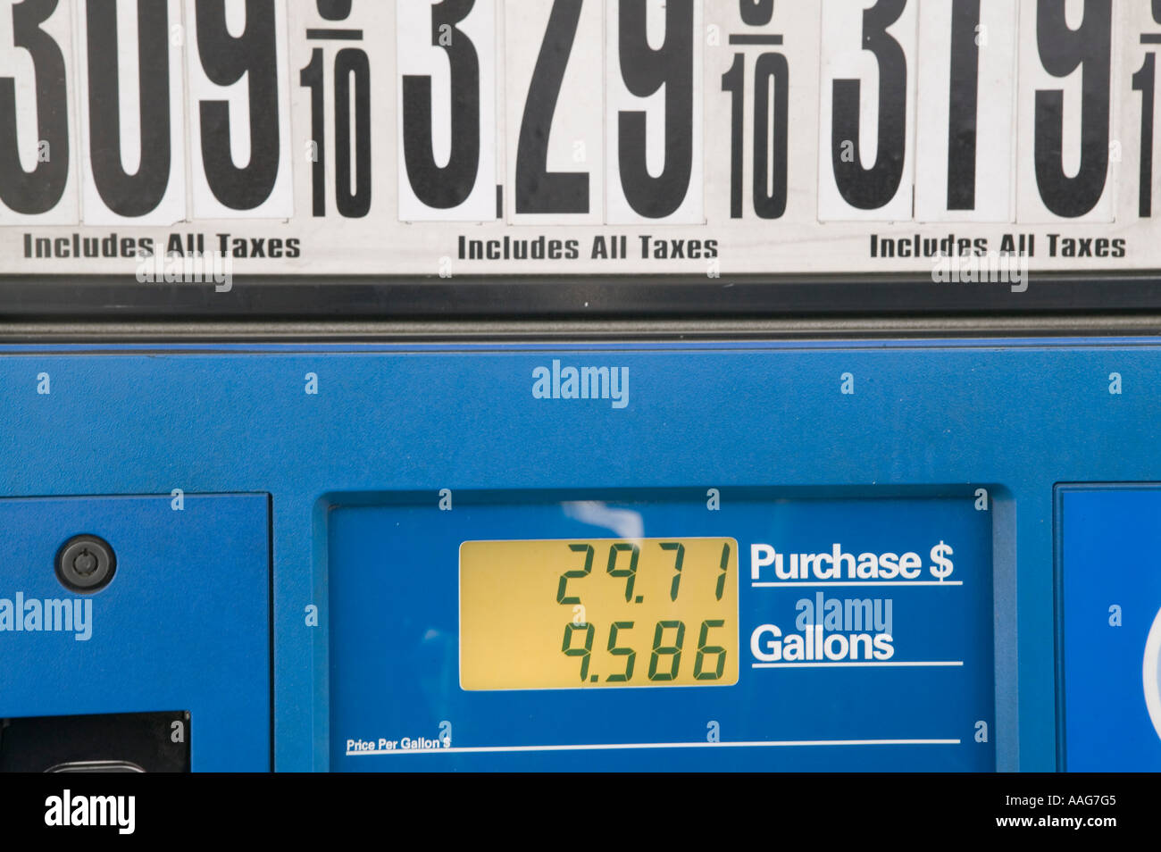 Filling up the car at a gas station in Harlem New York City USA April