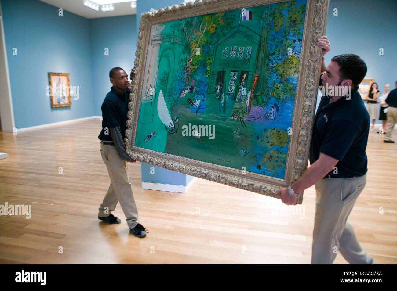 Workers carry Raoul Duffy painting during preview of Impressionism modern art sale at Sotheby s in New York City USA April 2006 Stock Photo