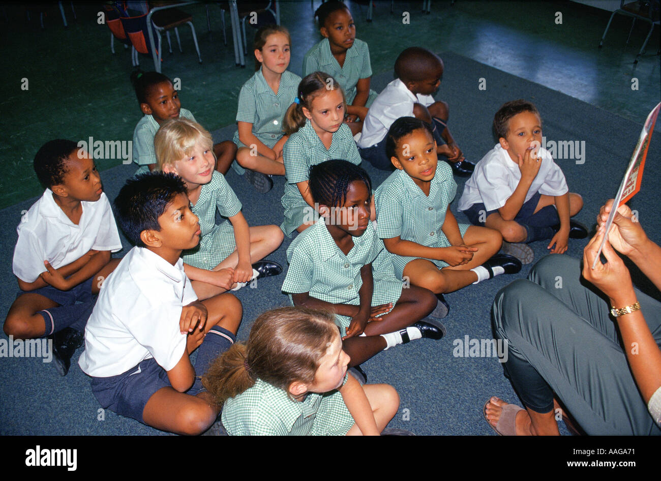 Multicultural children sitting on carpet Johannesburg Gauteng South