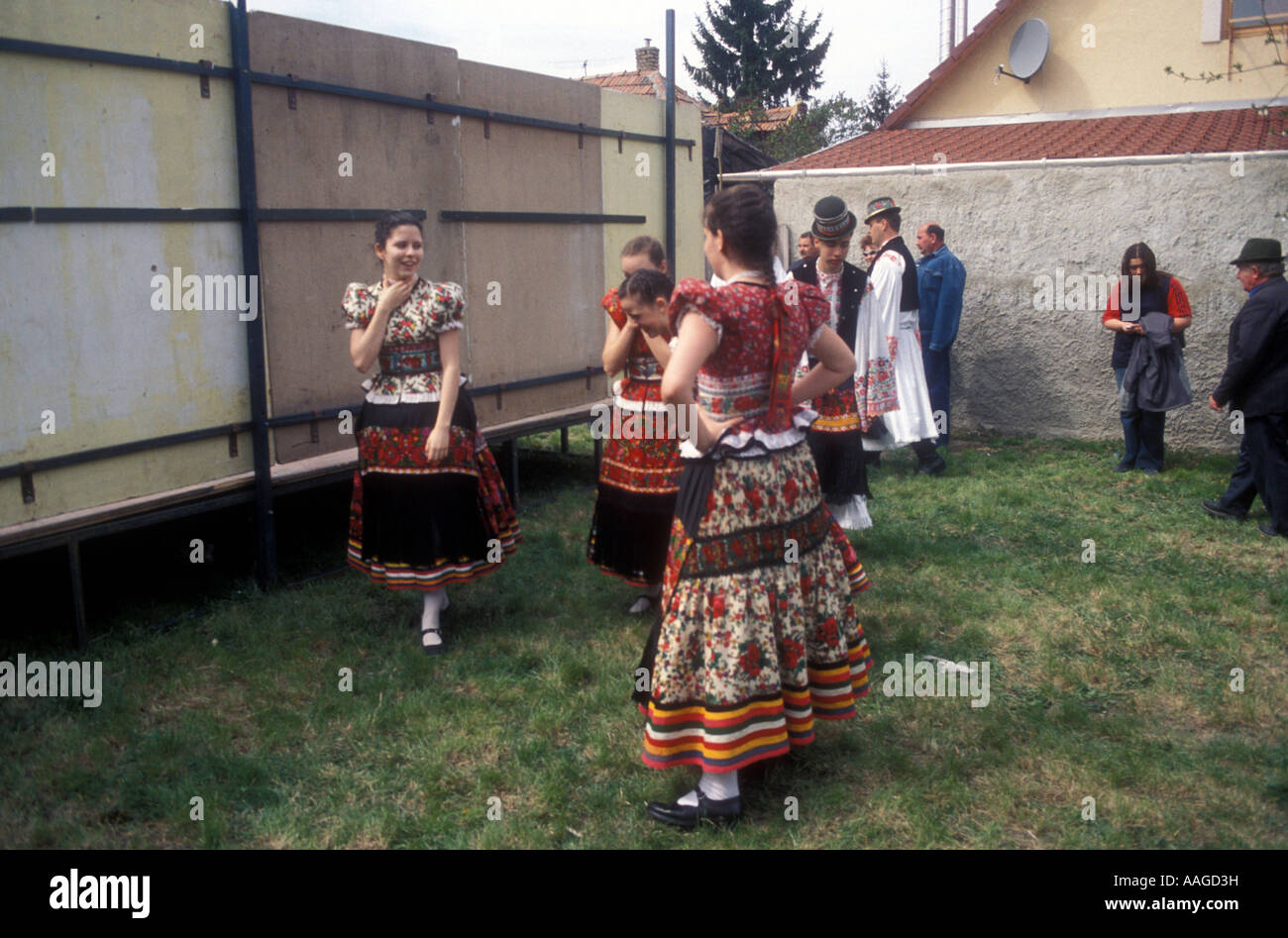 Girls in traditional dress, backstage at a dance performance during the Matyo Easter festival in Mezokovesd, Hungary Stock Photo
