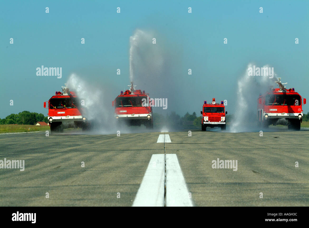 Rescue exercise of the airport fire service of the german airforce on the runway Stock Photo