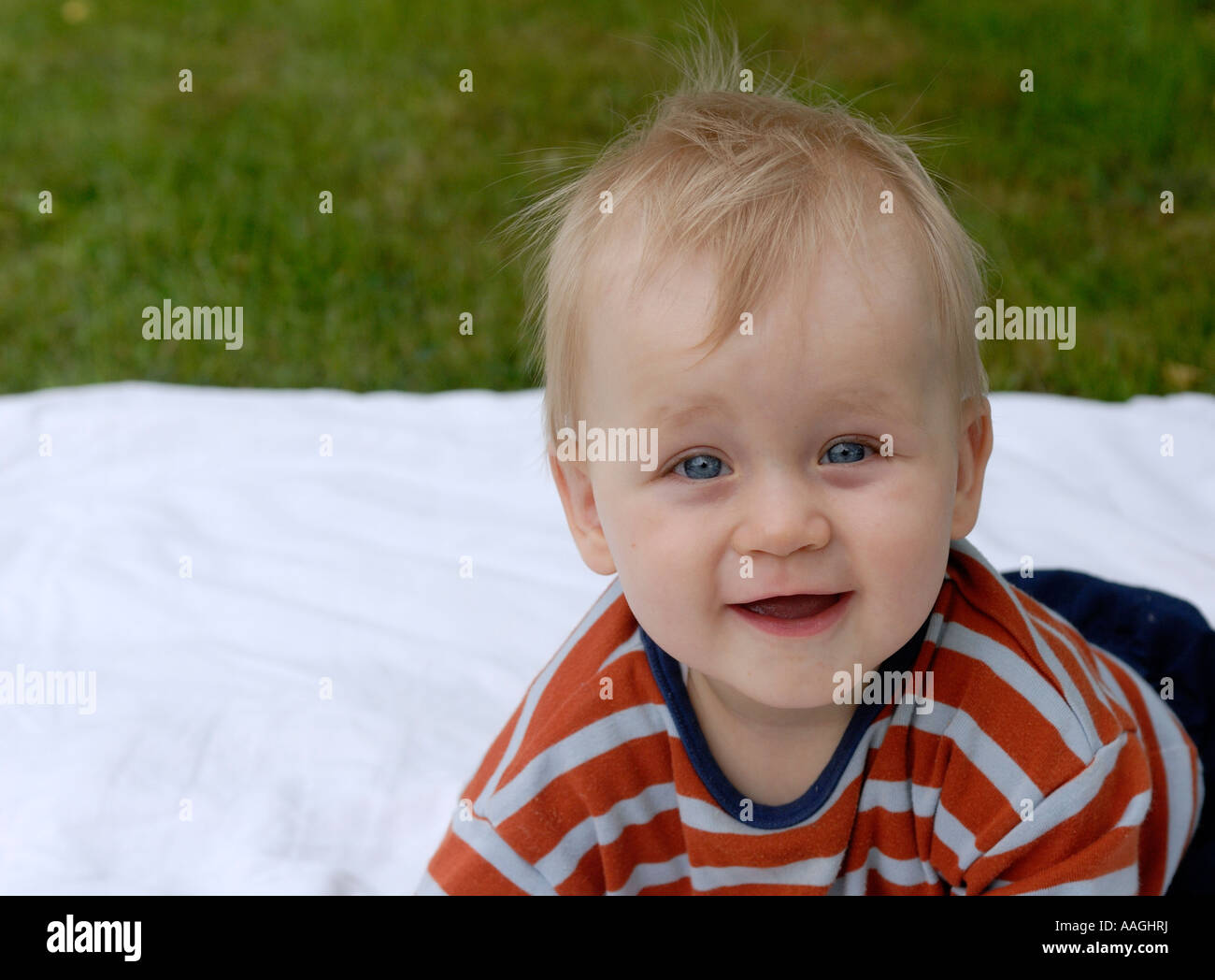 Baby boy Lying on white blanket Stock Photo Alamy