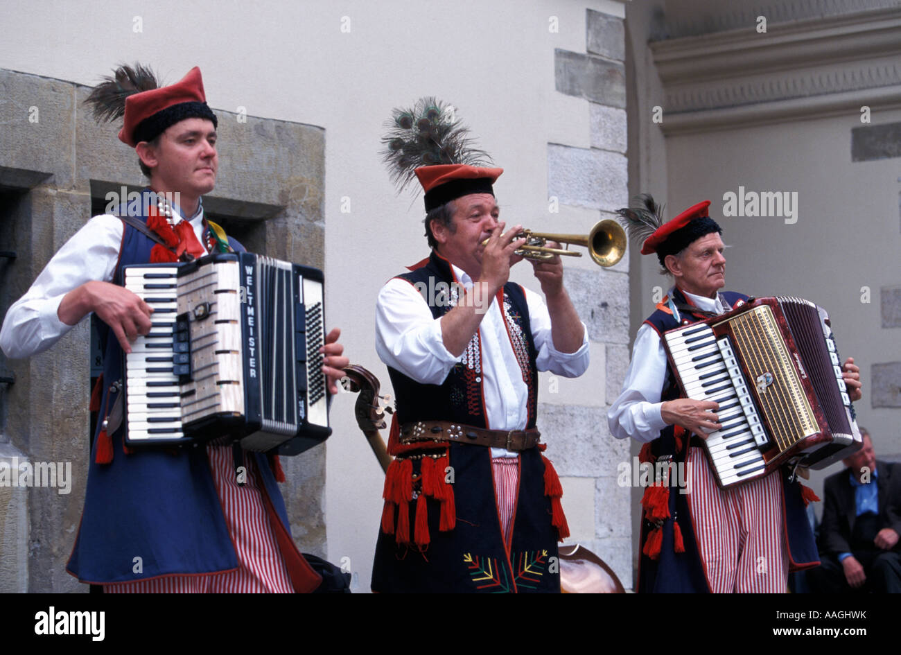 Musicians wearing traditional costumes main market square Kracow Lesser Poland Poland Stock Photo