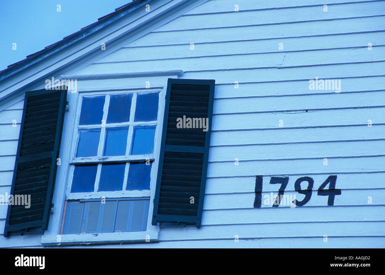 New Gloucester ME A window on Meetinghouse and the date it was built at the Sabbathday Lake Shaker Village  Stock Photo