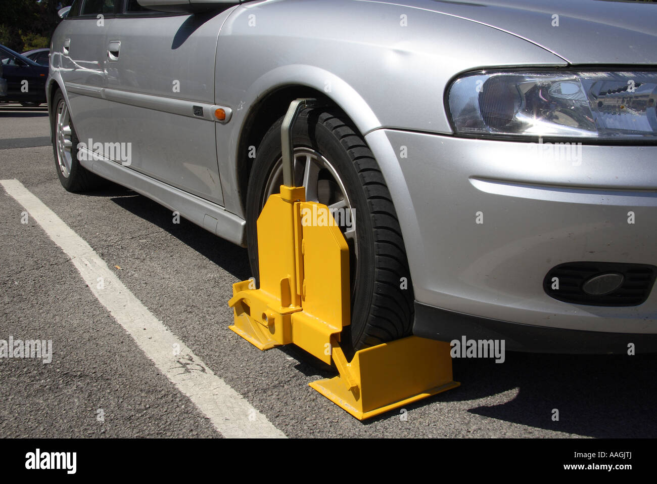 Car wheelclamped in private car park Lake Windermere Cumbria England