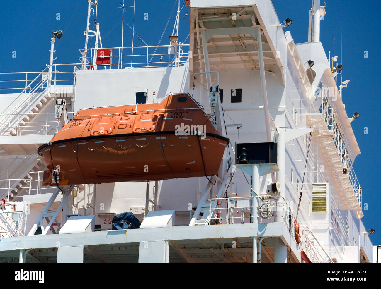 Crew escape craft and lifeboat on a cargo ship Stock Photo Alamy