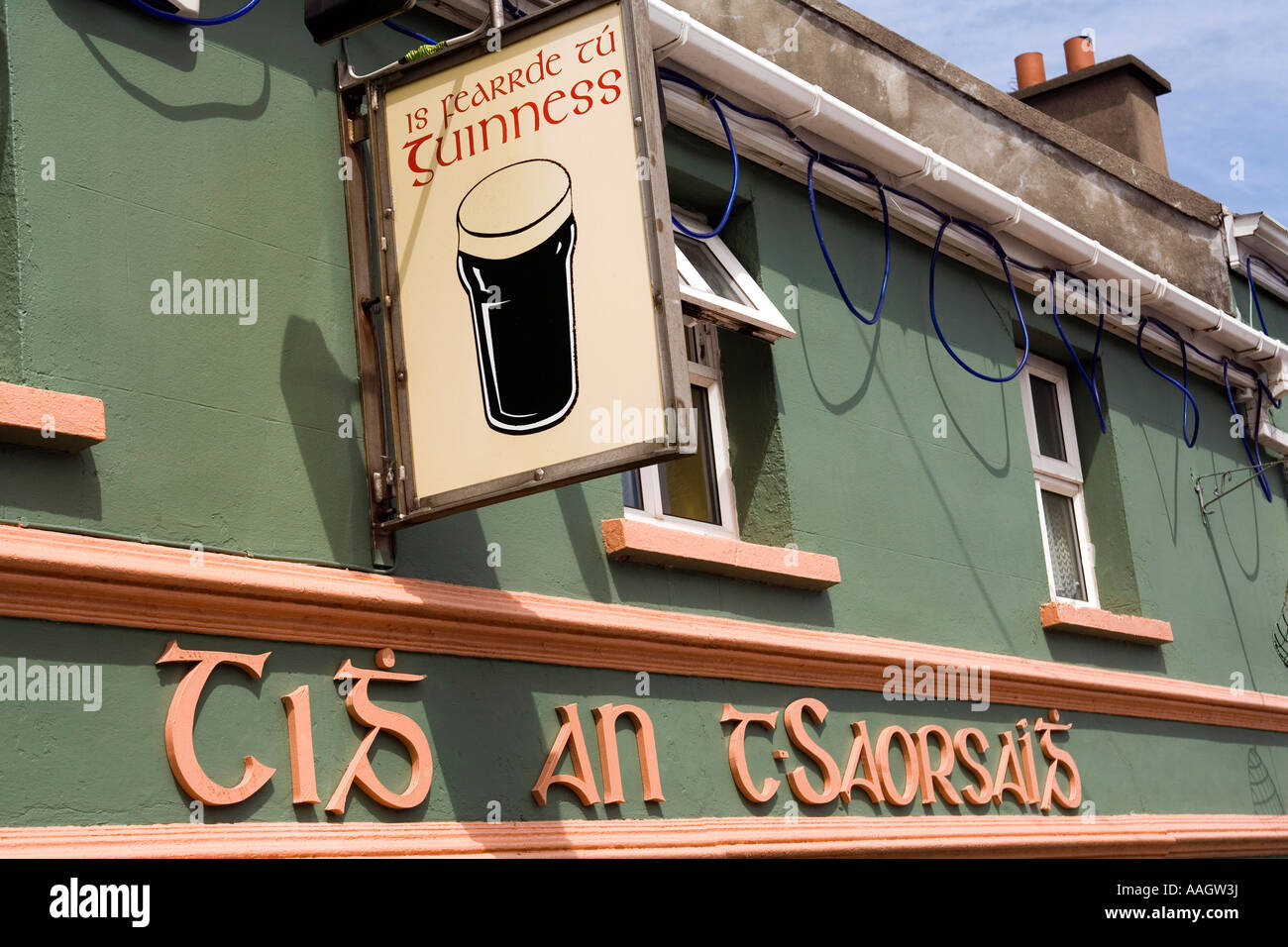 Ireland County Kerry Dingle Peninsula Ballyferriter village Gaelic language pub sign Stock Photo