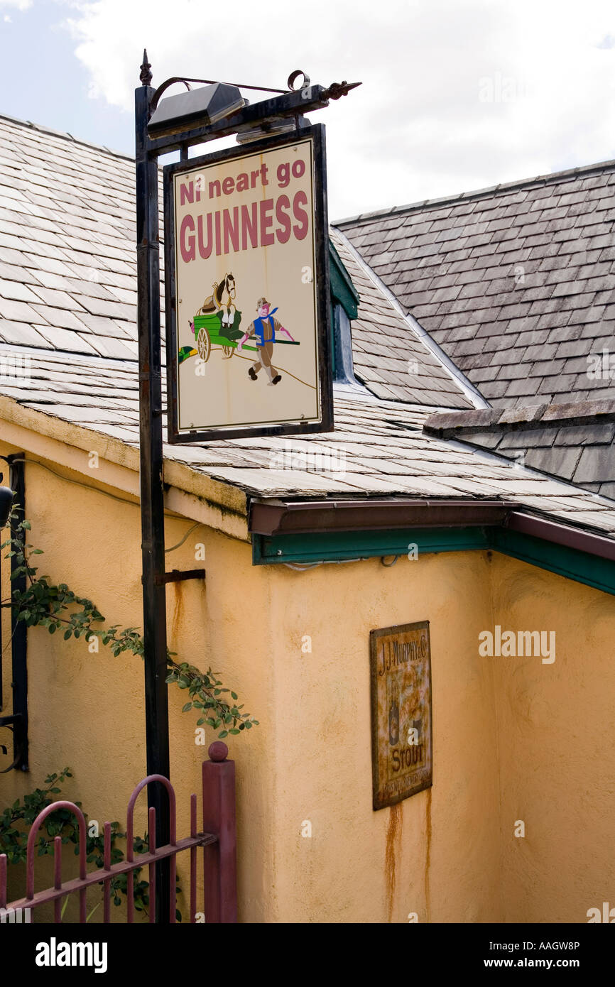 Ireland Kerry Dingle Peninsula Brandon village pub Gaelic Guinness sign Stock Photo