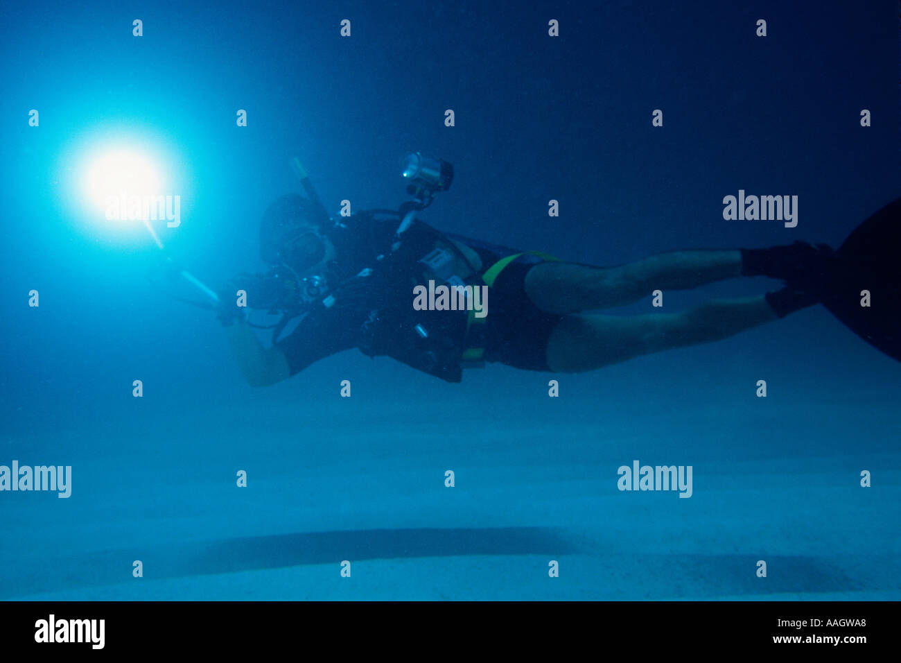 Underwater photographer Masa Ushioda taking picture Man of war cay Bahamas Caribbean Stock Photo