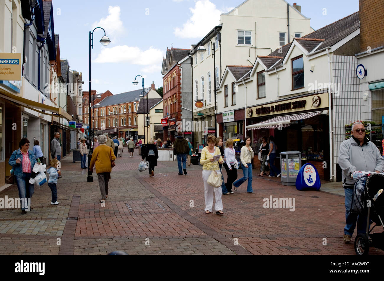 The pedestrianised main shopping street Amanford Ammanford carmarthenshire west wales UK Stock Photo