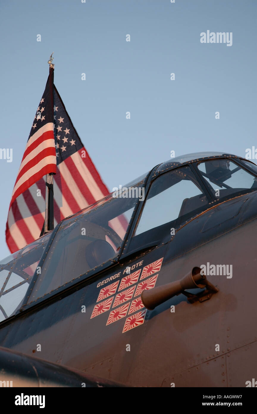 A cockpit of an American WW2 aircraft with an American flag and 