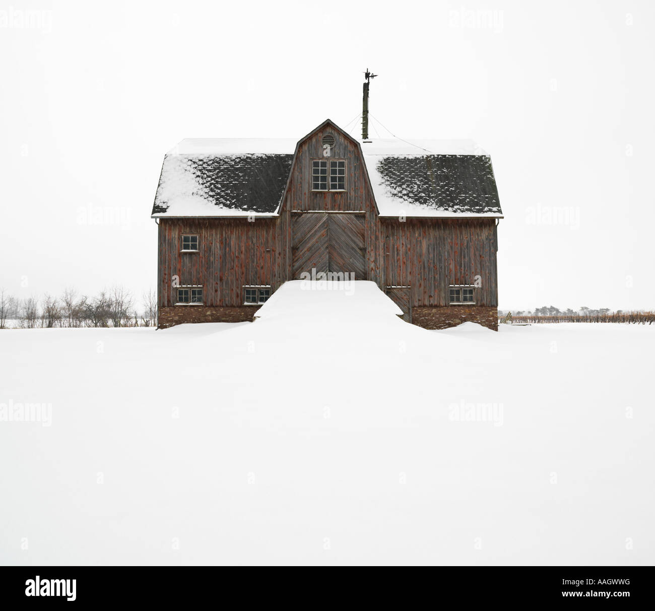 Canada Ontario Saint Catharines Niagara Region wooden barn circa 1870 s in the winter Stock Photo