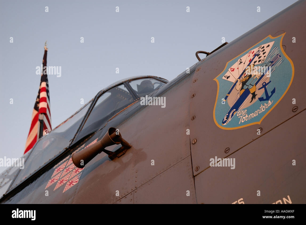 Insignia on the nose of an Amercian WW2 combat aircraft, reads 'The Tormentors'. Stock Photo