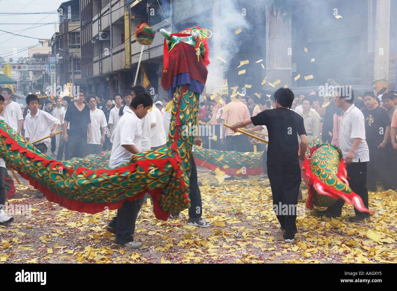 Men Holding Chinese Dragon At Matsu Festival Stock Photo